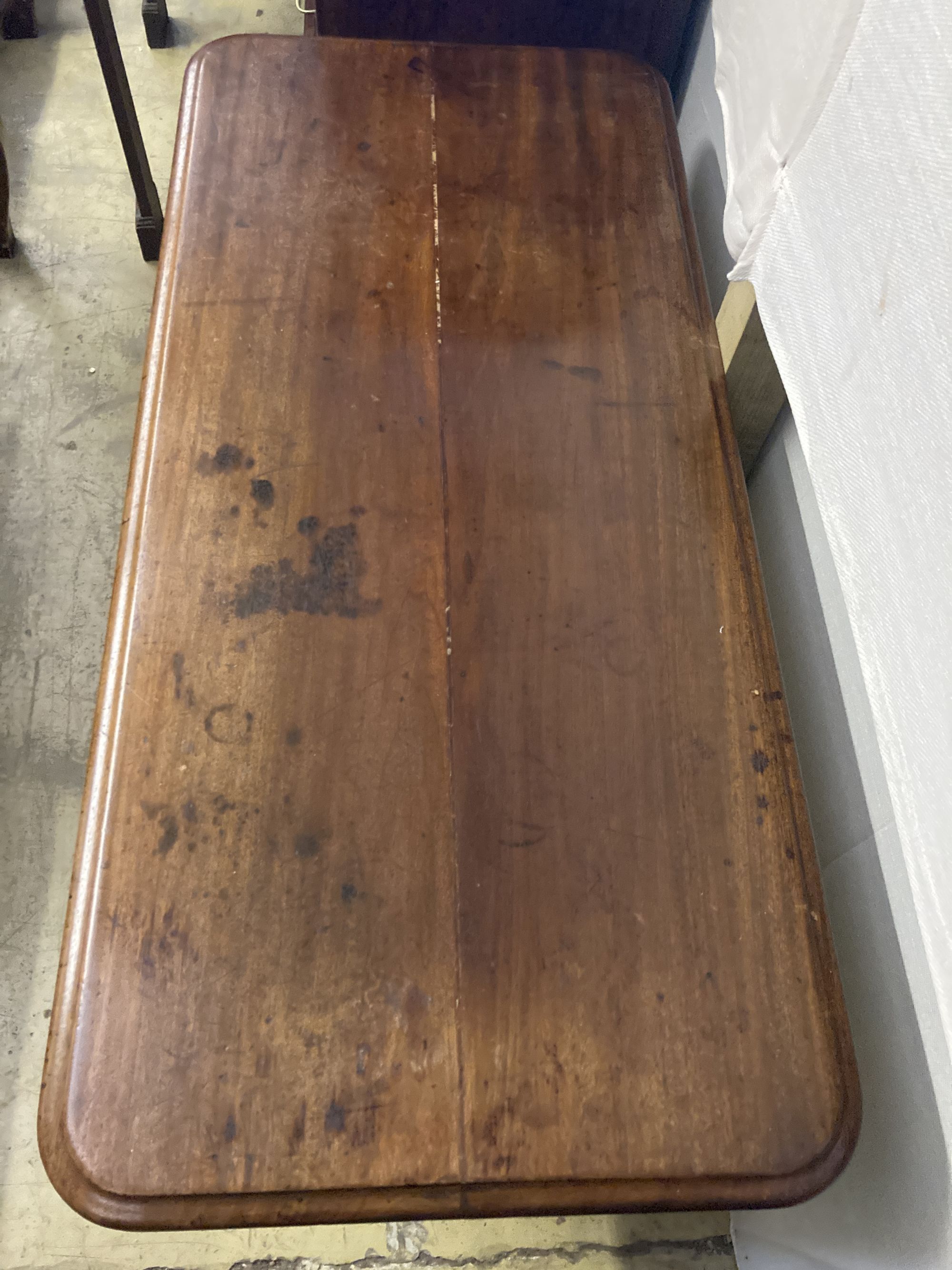 A Victorian mahogany side table with cast iron underframe, width 130cm, depth 60cm, height 80cm